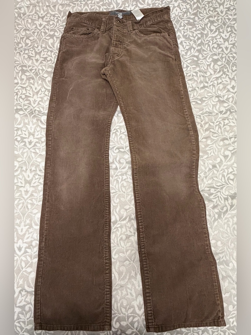 H&M corduroy straight leg pants in brown color.